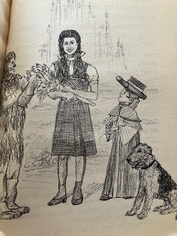 Boxcar Children Mystery on Stage Dorothy holding bouquet